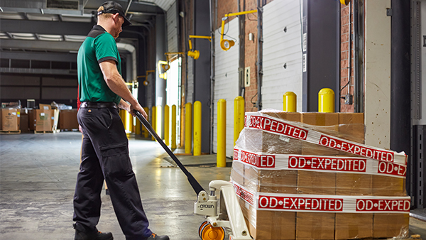 Driver_Unloading_Freight_Dock_600x338.jpg